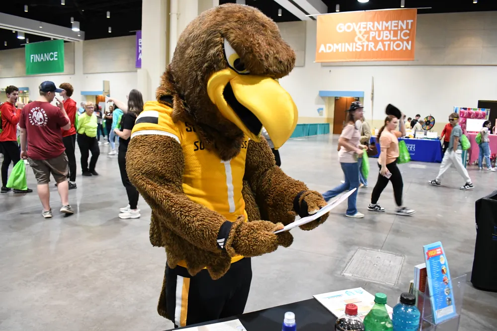 Southern Miss mascot engaging with attendees at a campus event