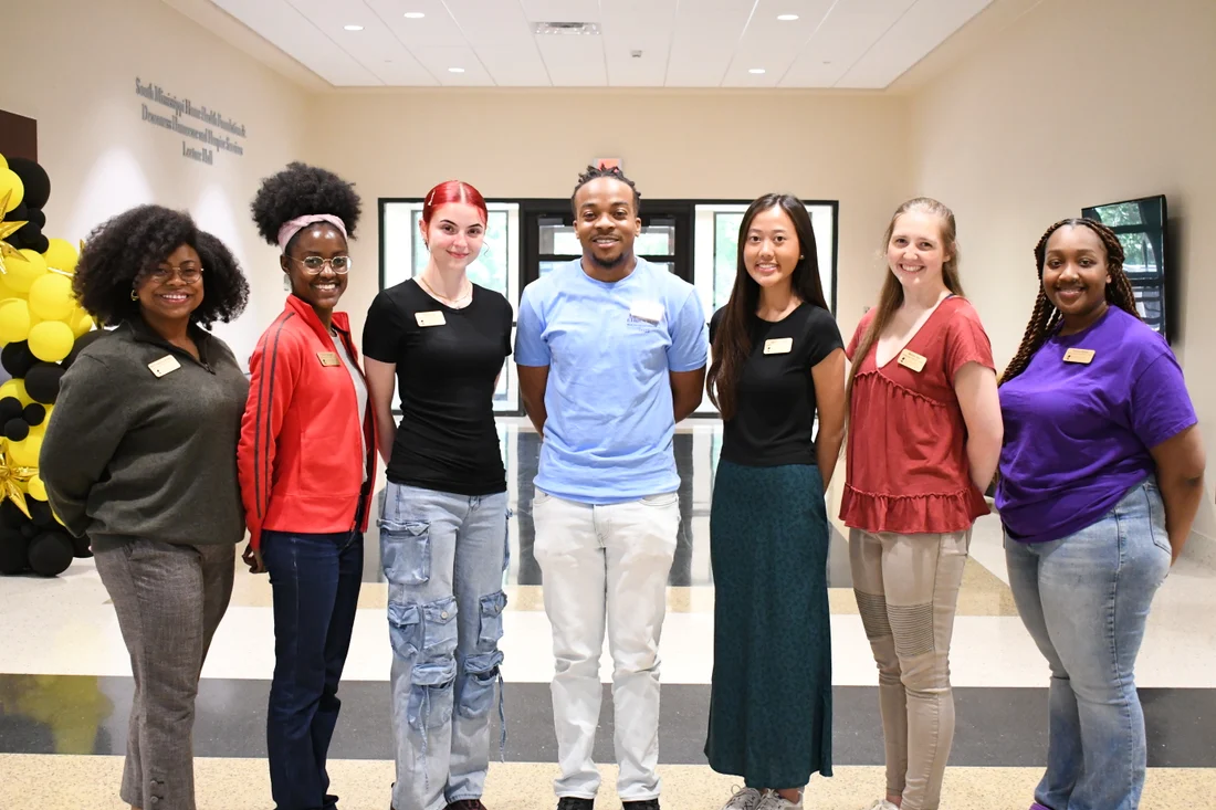 Students and professionals participating in a research training session