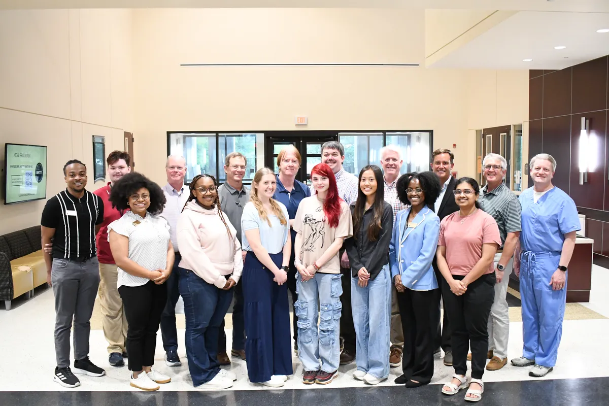 Southern Miss scholars, faculty, and program partners gathered together